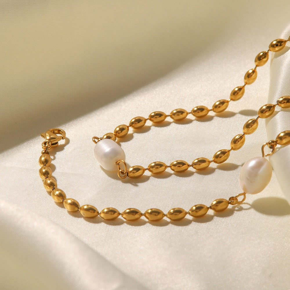 Wholesale Natural Freshwater Pearl Oval Golden Peas Titanium Steel Bracelet